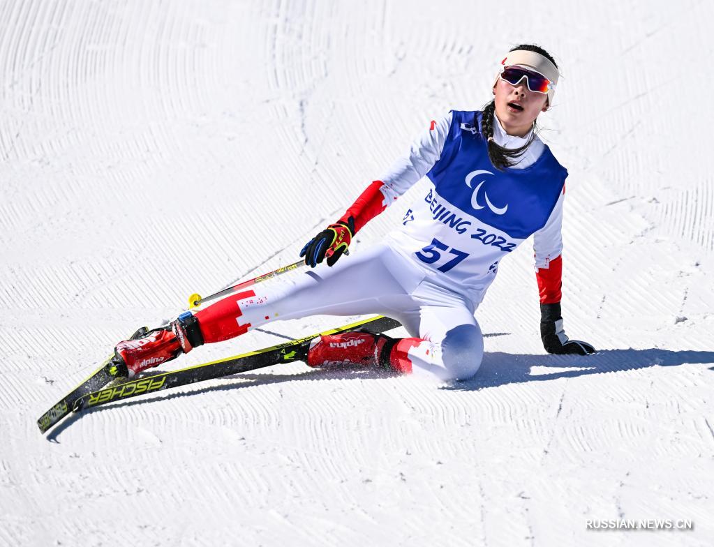 Китаянка Го Юйцзе -- чемпионка зимних Паралимпийских игр-2022 по  биатлонному спринту стоя_Russian.news.cn