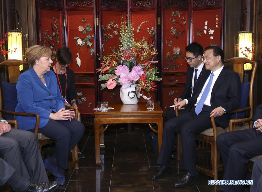 Ли Кэцян встретился с канцлером Германии А. Меркель 