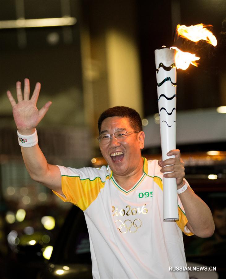 Китайский ветеран журналистики в четвертый раз стал участником эстафеты олимпийского огня