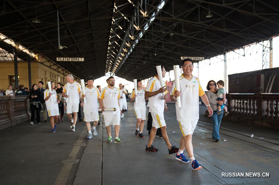 Китайский ветеран журналистики в четвертый раз стал участником эстафеты олимпийского огня