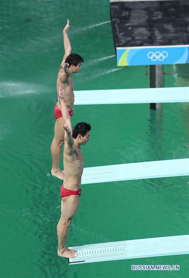 Китайцы Цинь Кай и Цао Юань завоевали бронзу в синхронных прыжках в воду с 3-метрового  трамплина на Олимпиаде в Рио