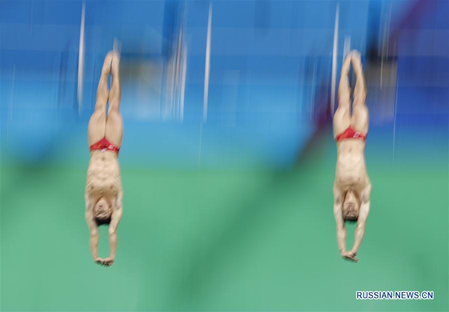 /Олимпиада-2016/ Китайцы Цинь Кай и Цао Юань завоевали бронзу в синхронных прыжках  в воду с 3-метрового трамплина на Олимпиаде в Рио
