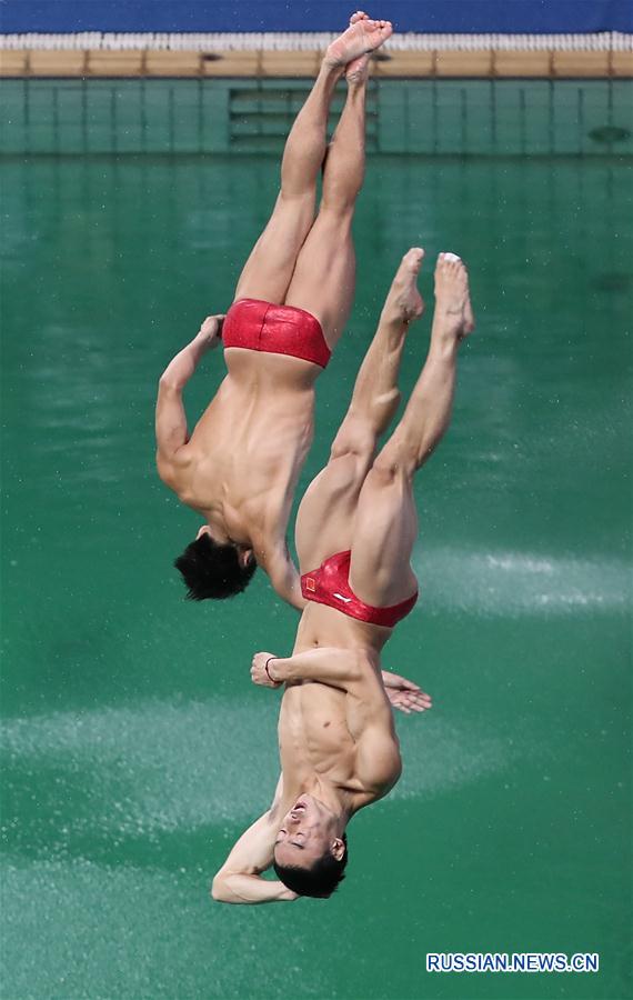 /Олимпиада-2016/ Китайцы Цинь Кай и Цао Юань завоевали бронзу в синхронных прыжках  в воду с 3-метрового трамплина на Олимпиаде в Рио