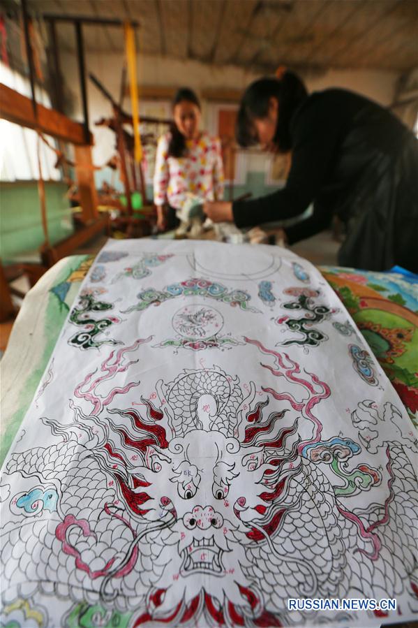 Ван Юйсян -- хранитель и новатор традиции производства шелковой ткани кэсы