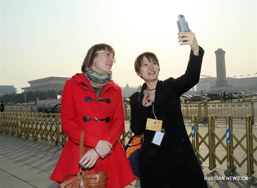 Иностранные корреспонденты Синьхуа впервые в истории агентства будут освещать работу "двух сессий" Китая
