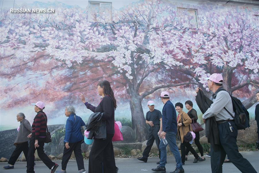 Строительство "красивых деревень" улучшило жизнь 380 тыс сельских жителей уезда Аньцзи