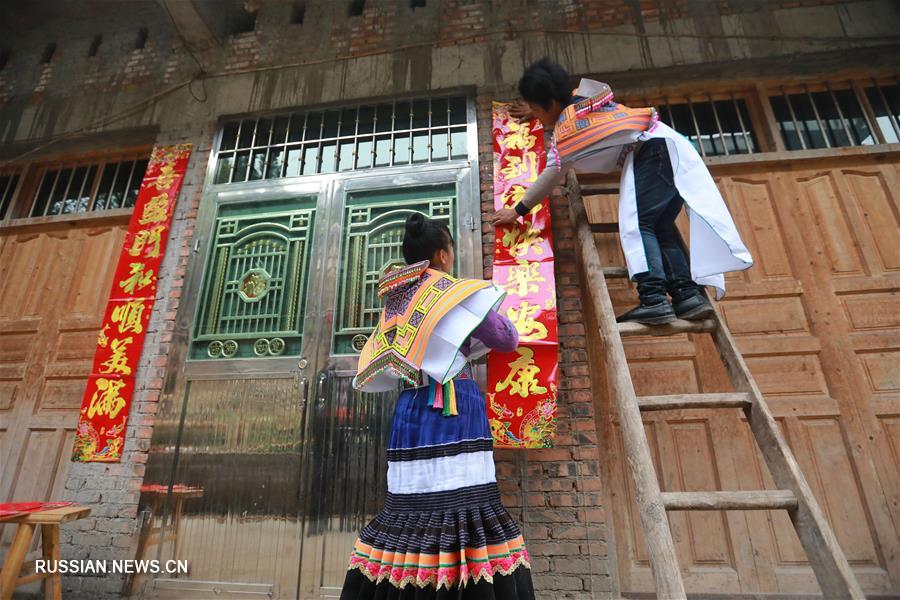Празднование Нового года в победившей бедность семье из провинции Гуйчжоу