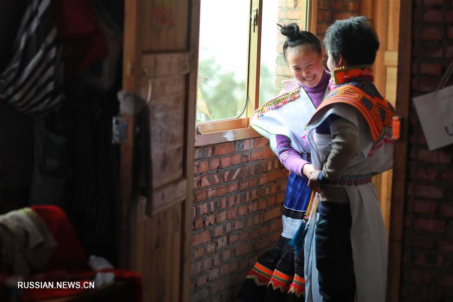 Празднование Нового года в победившей бедность семье из провинции Гуйчжоу