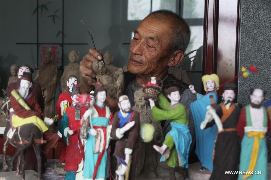 Потомственный мастер глиняной скульптуры из провинции Хэбэй