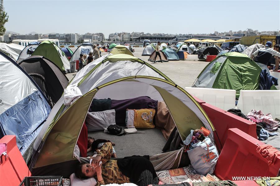 GREECE-PIRAEUS-REFUGEES-TOURISM