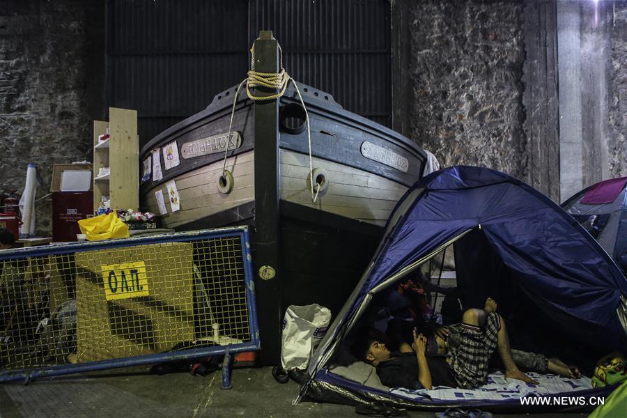 GREECE-PIRAEUS-REFUGEES-TOURISM