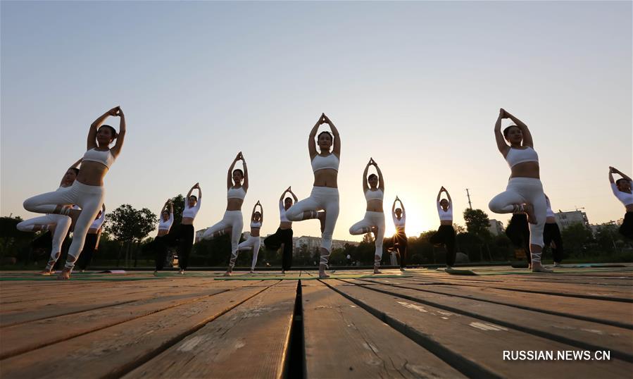 Йога на свежем воздухе в Цзяоцзо
