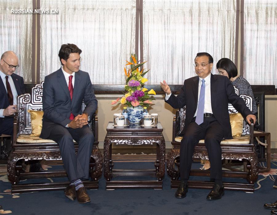Встреча глав правительств Китая и Канады в Пекине