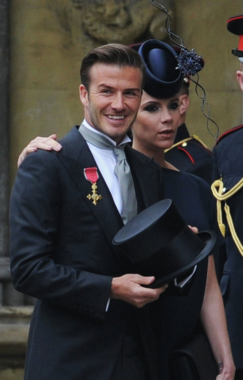 Дэвид Бекхэм и Виктория Бекхэм во время королевской свадьбы принца Уильяма и Кейт Миддлтон в Вестминстерском аббатстве