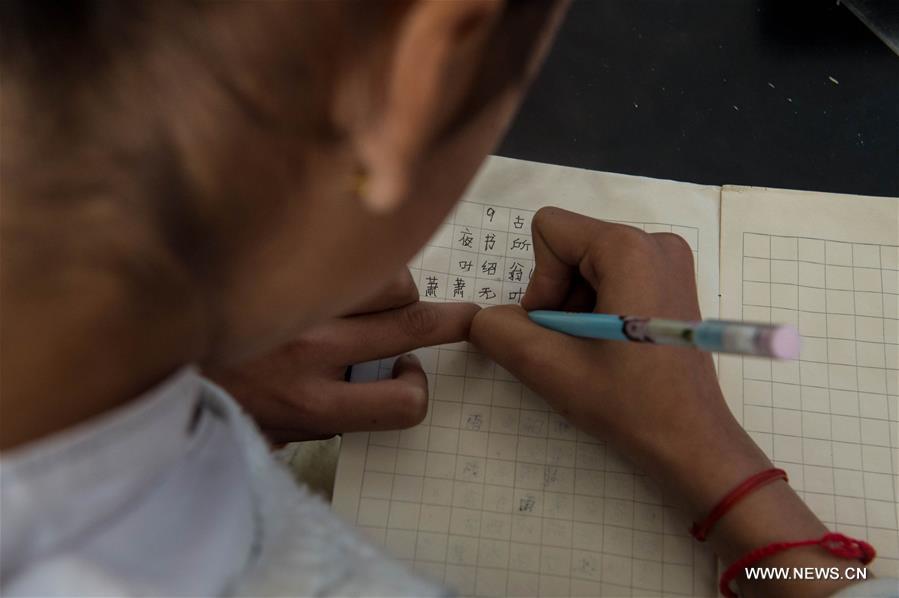 （教育）（5）中缅边境“一寨两国”里的国际学堂