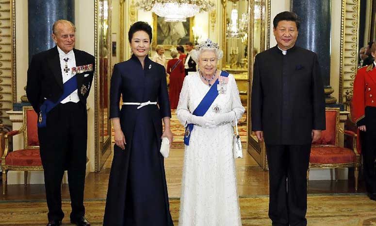 Си Цзиньпин и Пэн Лиюань присутствовали на приеме, устроенном в их честь королевой Елизаветой II