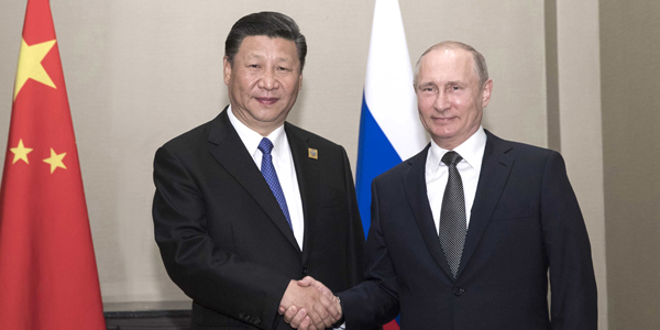 Си Цзиньпин встретился с В.Путиным в Астане