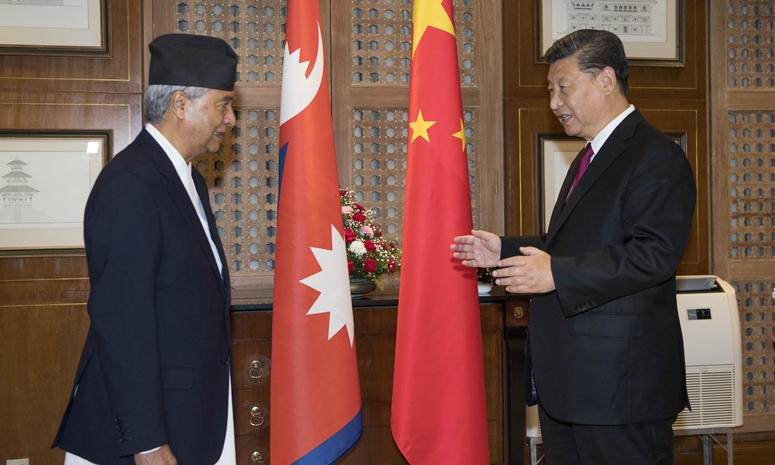 Си Цзиньпин встретился с председателем партии Непальский конгресс Шером Бахадуром Деубой
