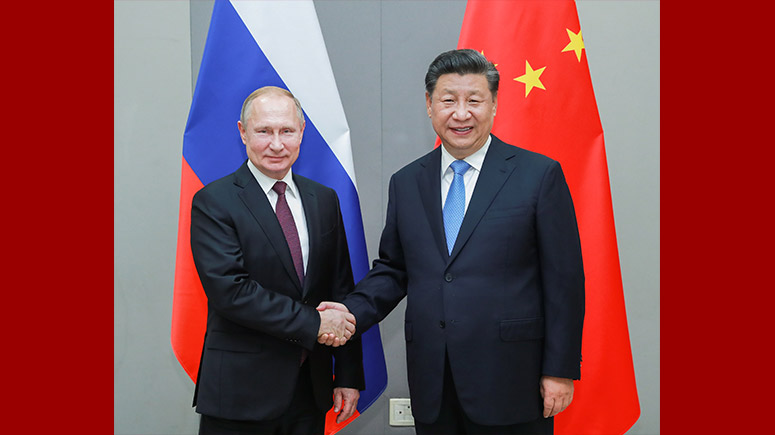 Си Цзиньпин провел встречу с В. Путиным