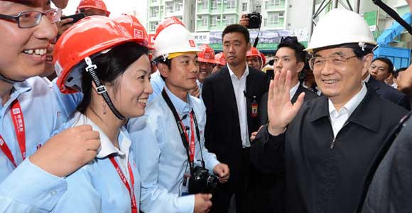 Ху Цзиньтао в Сянгане ознакомился с работой по осуществлению проекта строительства общественных зданий в районе бывшего аэропорта "Кайтак"