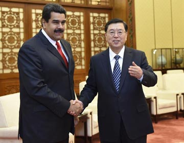Председатель ПК ВСНП Чжан Дэцзян встретился с президентом Венесуэлы
