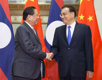 Ли Кэцян встретился с генеральным секретарем ЦК НРПЛ, президентом Лаоса Т.Сайнясоном
