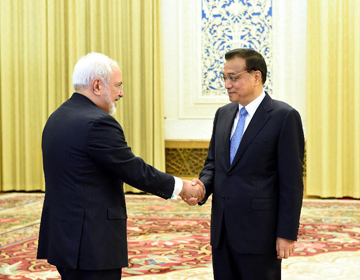 Ли Кэцян встретился с главой МИД Ирана