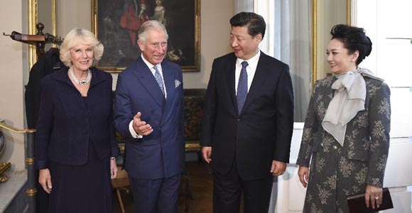В Лондоне состоялась встреча председателя КНР Си Цзиньпина и его супруги Пэн Лиюань 
с наследным принцем Великобритании Чарльзом и его супругой Камиллой