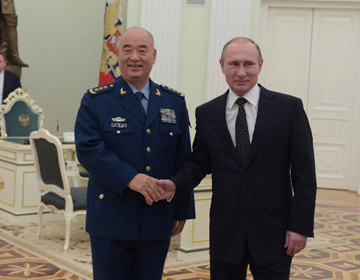 В.Путин встретился с Сюй Циляном