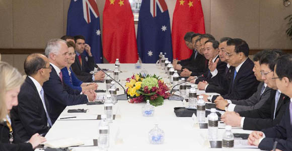 Главы правительств Китая и Австралии договорились о скорейшем вступлении в силу соглашения 
о свободной торговле между двумя странами