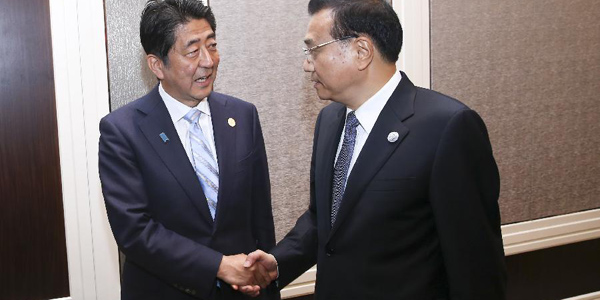 Япония не должна вмешиваться в проблему Южно-Китайского моря -- Ли Кэцян