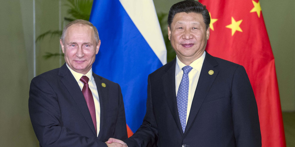 Си Цзиньпин провел встречу с президентом РФ В. Путиным