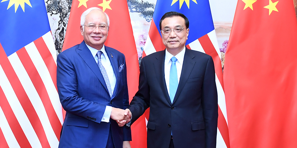 /Пояс и путь/ Ли Кэцян встретился с премьер-министром Малайзии Н.Разаком