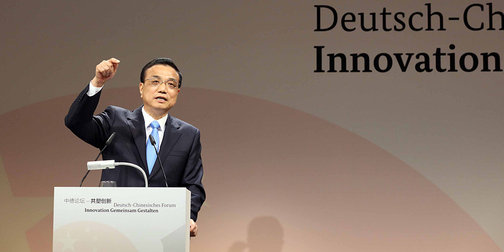 Ли Кэцян и Ангела Меркель приняли совместное участие в "Китайско-германском форуме 
-- совместные инновации"