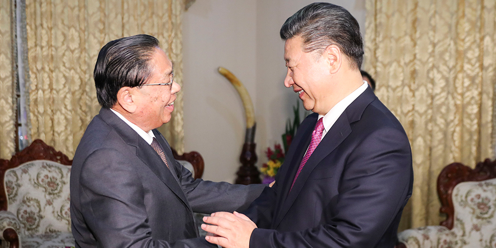 Си Цзиньпин встретился с бывшим генеральным секретарем ЦК НРПЛ, экс-президентом Лаоса Т. Сайнясоном